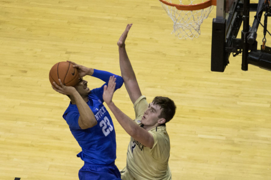 Jamal Murray fights to put up a shot against Vanderbilt's Luke Kornet during the first half of the game against Vanderbilt on Saturday, February 27, 2016 in Nashville, TN. Photo by Cameron Sadler | Staff 