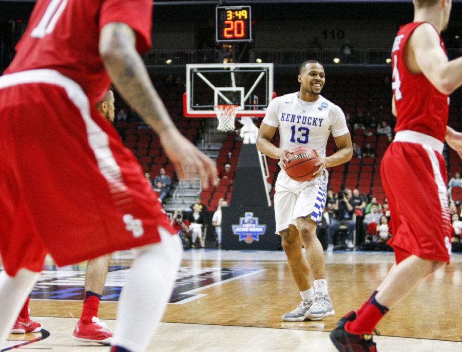 Guard Isaiah Briscoe laughs with the ball during the Wildcats game against the Stony Brook Seawolves during the first round of the NCCA tournament at Wells Fargo Arena on March 16, 2016 in Des Moines, Iowa. Photo by Taylor Pence