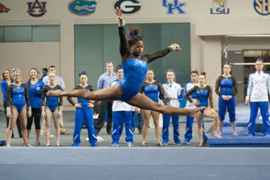 Junior Taylor Puryear competes on the floor during the meet against the Florida Gators on Friday, March 4, 2016 in Lexington, Ky. Photo by Hunter Mitchell | Staff