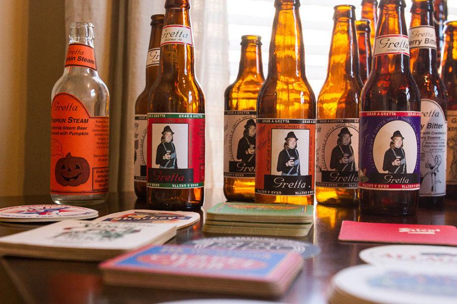 Paul Minzners collection of coasters and bottles at his home in Lexington on Wednesday, April 13, 2016 in Lexington, Ky. Photo by Adam Pennavaria | Staff