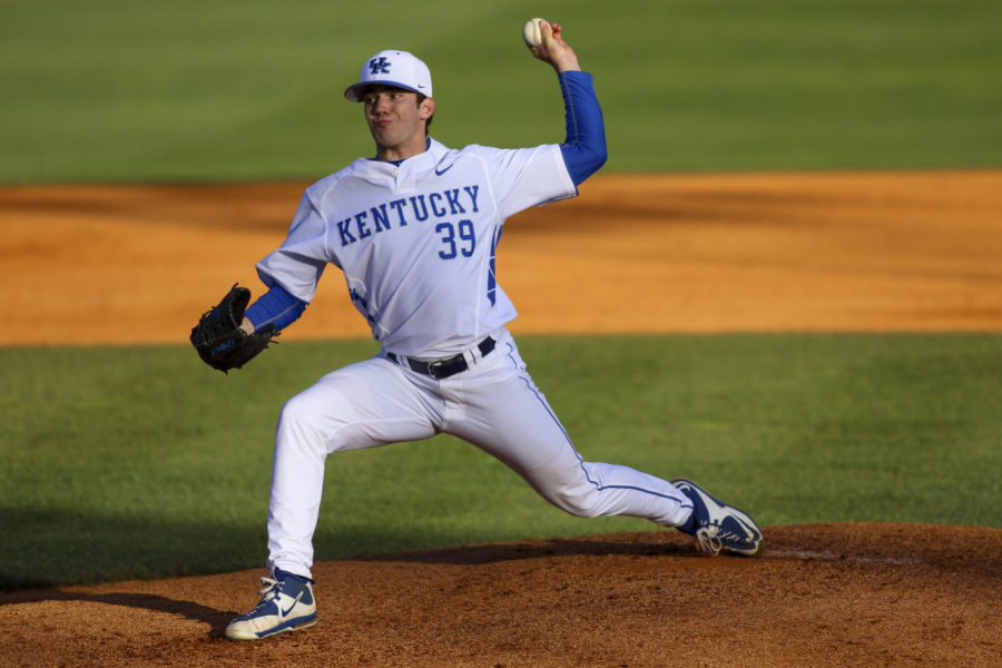 Pitcher Zach Logue delivers a pitch during the game against the Louisville Cardinals at Cliff Hagan Stadium in , Ky. on Wednesday, April 13, 2016. Photo by | Staff.