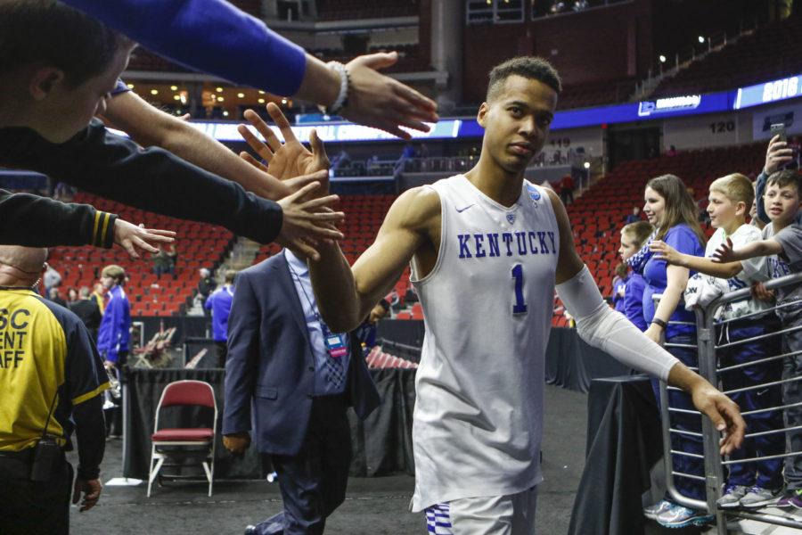Forward Skal Labissiere high fives young fans after the Wildcats game against the Stony Brook Seawolves during the first round of the NCCA tournament at Wells Fargo Arena on March 16, 2016 in Des Moines, Iowa. Photo by Taylor Pence