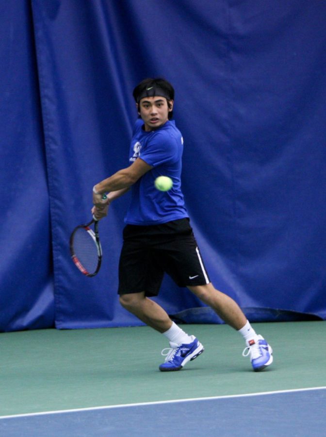 UK sophomore Kevin Lai returns a shot during the UK mens tennis match against Michigan State in Lexington, Ky., on Sunday, February, 9, 2014. Photo by Jonathan Krueger