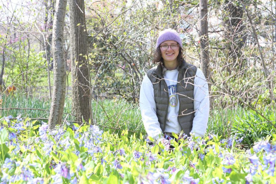 Psychology senior Tessa Adkins works in Mathews Garden. She goes to the garden every day, and hopes UK will not tear it down.
