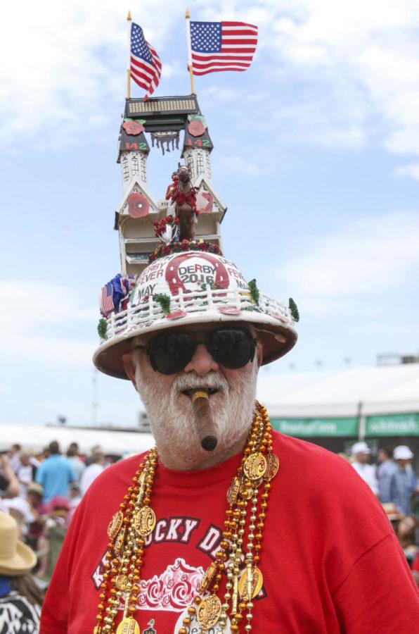 Ernie Trent shows off his festive hat during the 142nd running of the Kentucky Derby at Churchill Downs on Saturday, May 7, 2016 in Louisville, Ky.
