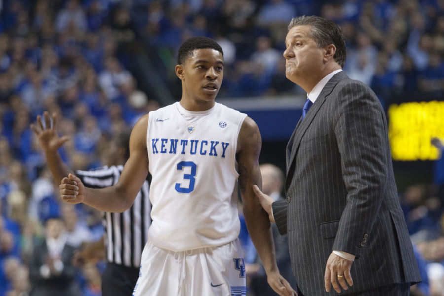 Guard Tyler Ulis and head coach John Calipari of the Kentucky Wildcats talk during a free throw during the game against the North Carolina Tar Heels at Rupp Arena on Saturday, December 13, 2014 in Lexington, Ky. Kentucky defeated North Carolina 84-70. Photo by Michael Reaves | Staff 