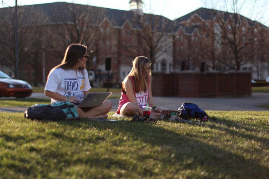 UK students, Hannah (left) and Lauren (right), studying on a sunny day at the University of Kentucky in Lexington, Ky. on Tuesday, March 8, 2016. Photo by Josh Mott | Staff.