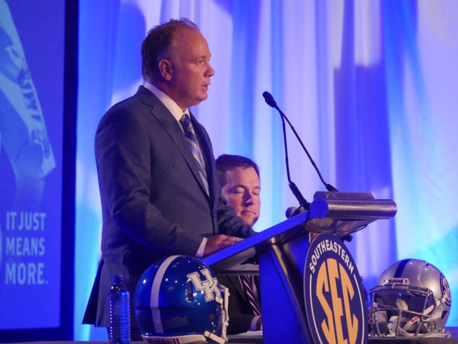 UK+football+head+coach+Mark+Stoops+at+the+podium+during+SEC+Media+Days+in+Hoover%2C+Alabama.