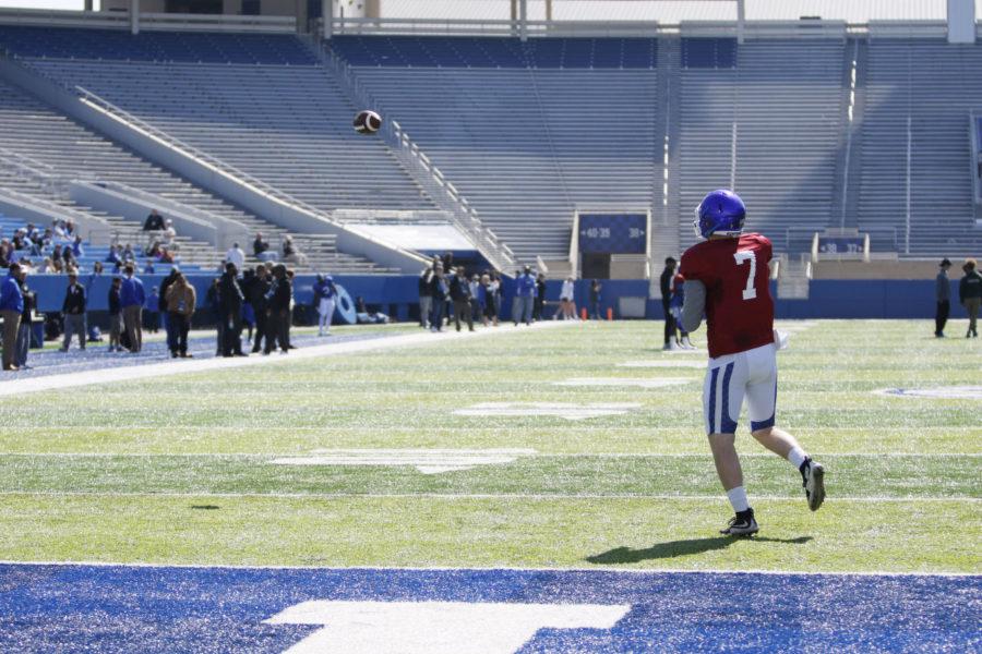 Returning quarterback Drew Barker throws to the sideline during the first open practice at Commonwealth Stadium in Lexington, Ky. on Saturday, March 26, 2016. Photo by Josh Mott | Staff.