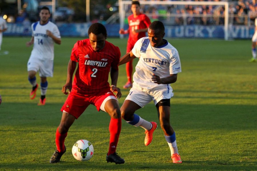 Napo Matsoso tries to steal the ball from the Louisville defense during the Kentucky mens soccer match against Louisville at the Wendell and Vickie Bell Soccer Complex in Lexington, Ky., on Tuesday, September 23, 2014. Photo by Jonathan Krueger