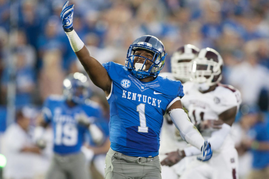 Kentucky wide receiver Ryan Timmons celebrates during the second half of the Kentucky Wildcats game against the Mississippi State Bulldogs at Commonwealth Stadium on Saturday, October 25, 2014 in Lexington, Ky. Mississippi State defeated Kentucky 45-31. Photo by Adam Pennavaria | Staff