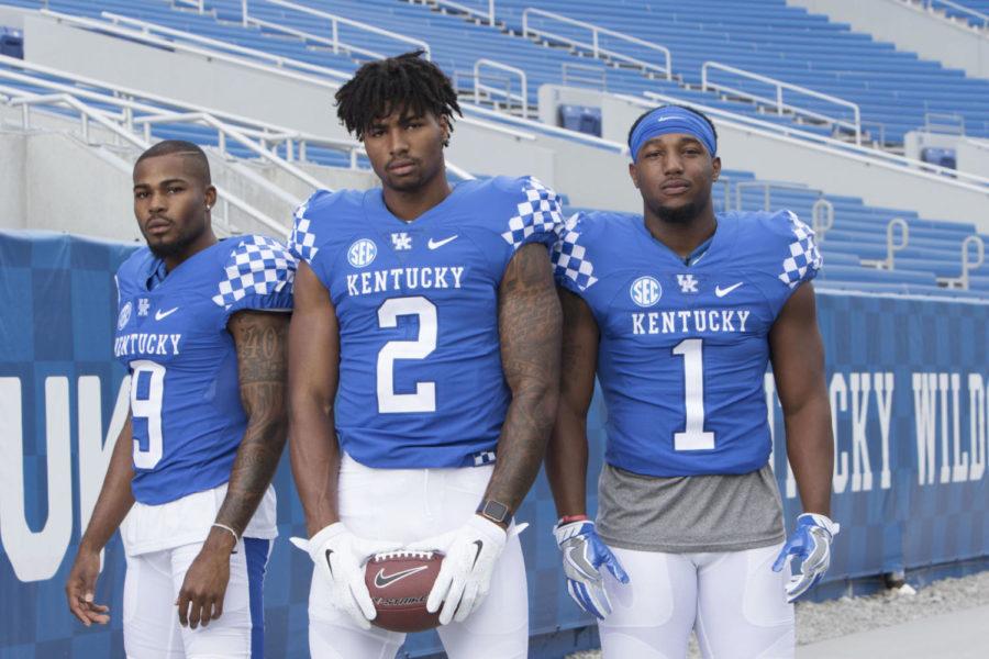 Wide+receivers+Garrett+Johnson%2C+Dorian+Baker%2C+and+Ryan+Timmons+pose+together+during+the+University+of+Kentucky+Football+media+day+on+Friday%2C+August+5%2C+2016+in+Lexington%2C+Ky.+Photo+by+Hunter+Mitchell+%7C+Staff