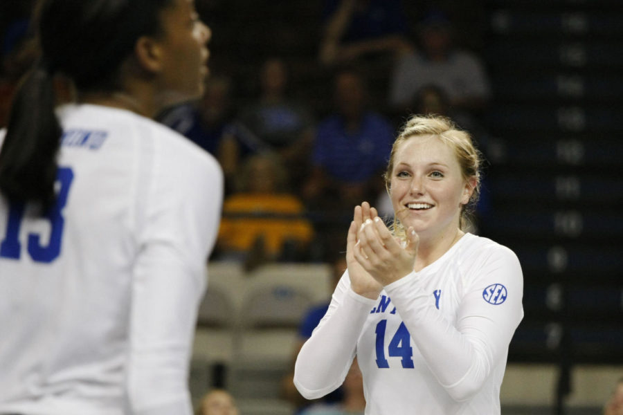 Defensive specialist Harper Hempel smiles after a scored point during the match against Marquette on Friday, September 9, 2016 in Lexington, Ky. Marquette won the match 3-1. Photo by Hunter Mitchell | Staff