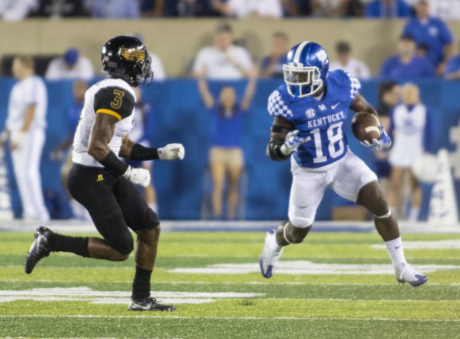 Kentucky running back Stanley Boom Williams rushes with the ball during the Wildcat's game against the Southern Miss Golden Eagles at Commonwealth Stadium on September 2, 2016 in Lexington, Kentucky.