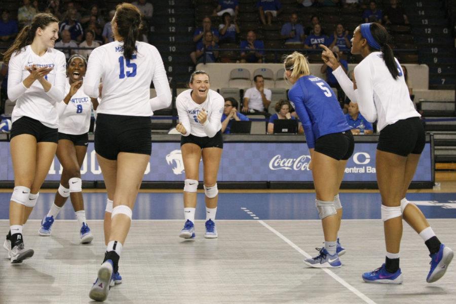 The University of Kentucky womens volleyball team celebrates after scoring a point during the match against the Georgia Bulldogs on Wednesday, September 21, 2016 in Lexington, Ky. Kentucky won the game 3-0. Photo by Hunter Mitchell | Staff