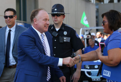Kentucky Wildcats head coach Mark Stoops greets fans at UK Stadium on Saturday, September 3, 2016 in Lexington, Ky. Photo by Lydia Emeric | Staff 