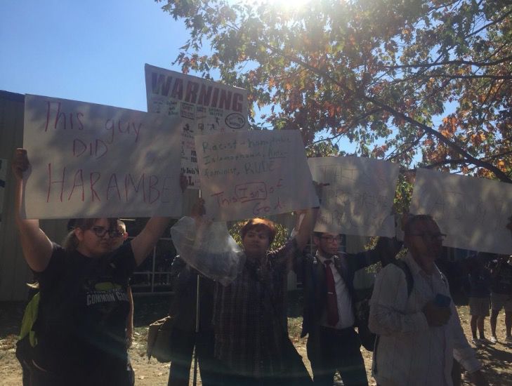 Students rally against religious protesters on campus. Photo by Emily Cole.