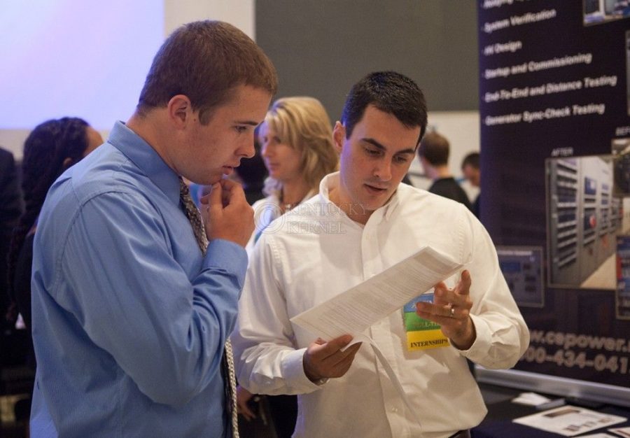 Sophomore electrical engineering major Colin Schwerin talks with CE Power Solutions business development manager Alex Janesz at the Career fair Lexington, Ky., at the Student Center on Tuesday, September 24, 2013. Photo by Emily Wuetcher