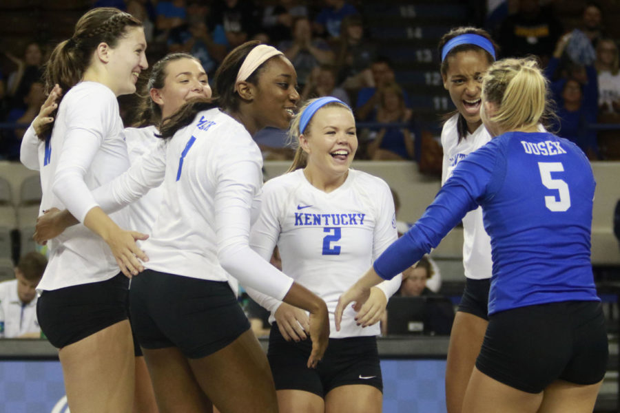 The+University+of+Kentucky+womens+volleyball+team+celebrates+after+a+scored+point+during+the+match+against+Ole+Miss+on+Sunday%2C+October+16%2C+2016+in+Lexington%2C+Ky.+Photo+by+Hunter+Mitchell+%7C+Staff