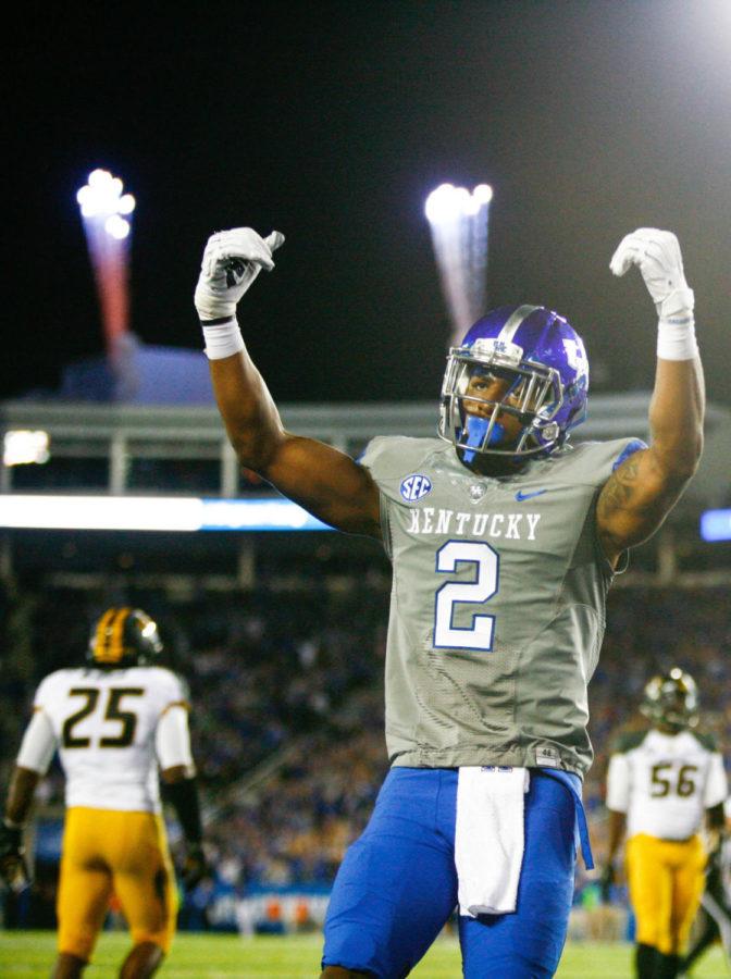 Kentucky+wide+receiver+Dorian+Baker+%282%29+celebrates+after+scoring+a+touchdown+during+the+second+half+of+the+game+against+the+Missouri+Tigers+at+Commonwealth+Stadium+on+Saturday%2C+September+26%2C+2015+in+Lexington%2C+Ky.+Kentucky+defeated+Missouri+21+to+13.+Photo+by+Adam+Pennavaria+%7C+Staff