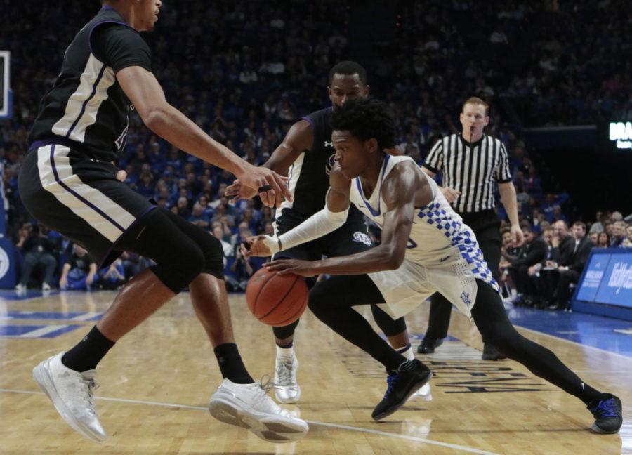 Freeman guard DeAaron Fox splits two defenders during the game against Stephen F. Austin on Friday, November 11, 2016 in Lexington, Ky. Photo by Carter Gossett | Staff