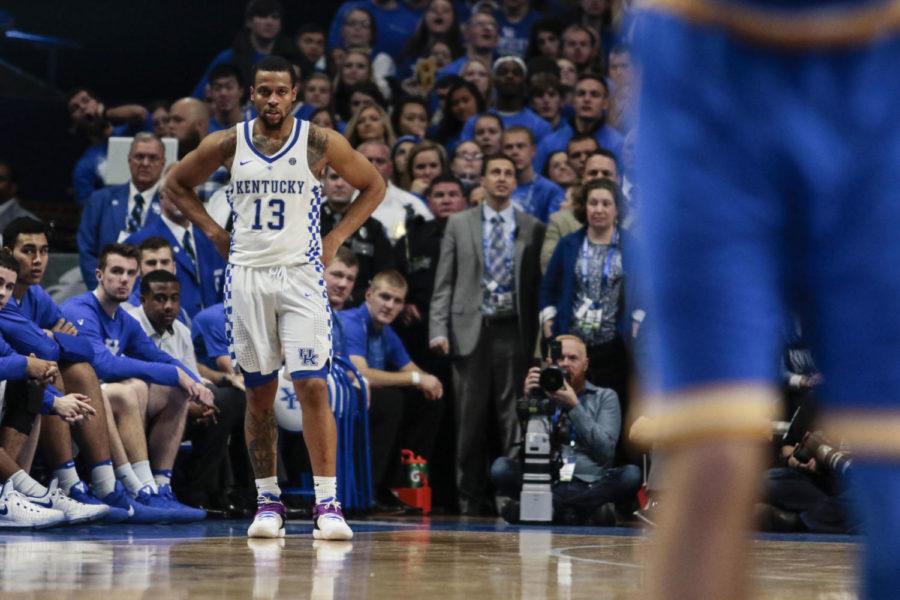 Kentucky guard Isaiah Briscoe watches as a UCLA player shoots a free throw during the Wildcats game against the UCLA Bruins at Papa Johns Stadium on December 3, 2016 in Louisville, Kentucky.