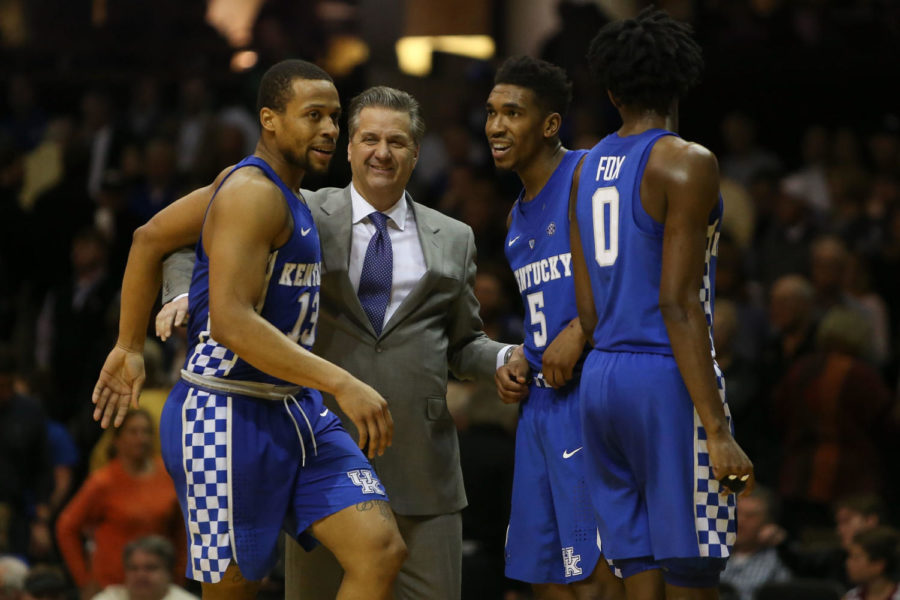 Kentucky Wildcats head coach John Calipari celebrates with guards Isaiah Briscoe, Malik Monk and DeAaron Fox in the closing minutes against the Vanderbilt Commodores during the second half at Memorial Gymnasium in Nashville, Tennessee on Tuesday, January 10, 2017. Photo by Michael Reaves | Staff