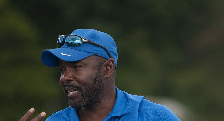 Edrick Floreal coaches the track team in Lexington, Ky.,on Monday, September 8, 2014. Photo by Michael Reaves