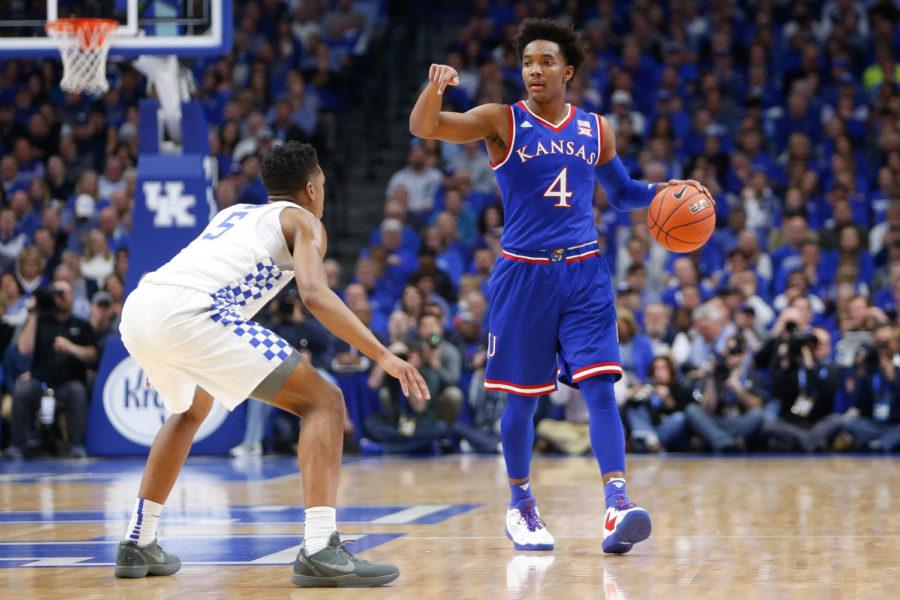 Kansas Jayhawks guard Devonte Graham dribbles up court against Kentucky Wildcats guard Malik Monk on Saturday January 28, 2017 at Rupp Arena in Lexington, Ky. Photo by Michael Reaves | Staff