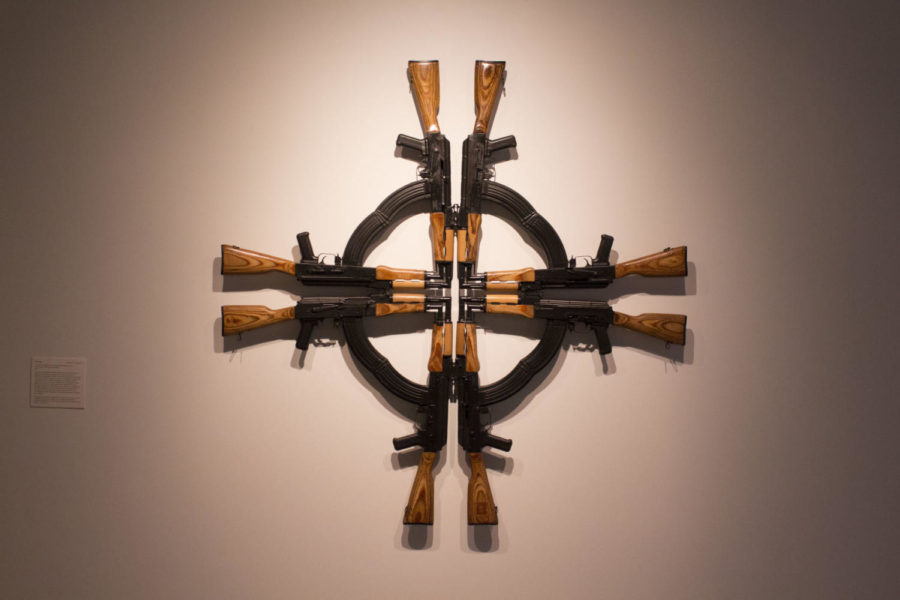 UNLOADED is a group art show curated by Susanne Slavick. The show features art touching on the issues surrounding the use of firearms and the impact guns have in modern day society. Mel Chins Cross for the Unforgiven is a piece featured in the show. The Bolivar Art Gallery is located in the School of Art and Visual Studies building on UKs campus. Photo by Arden Barnes | Staff