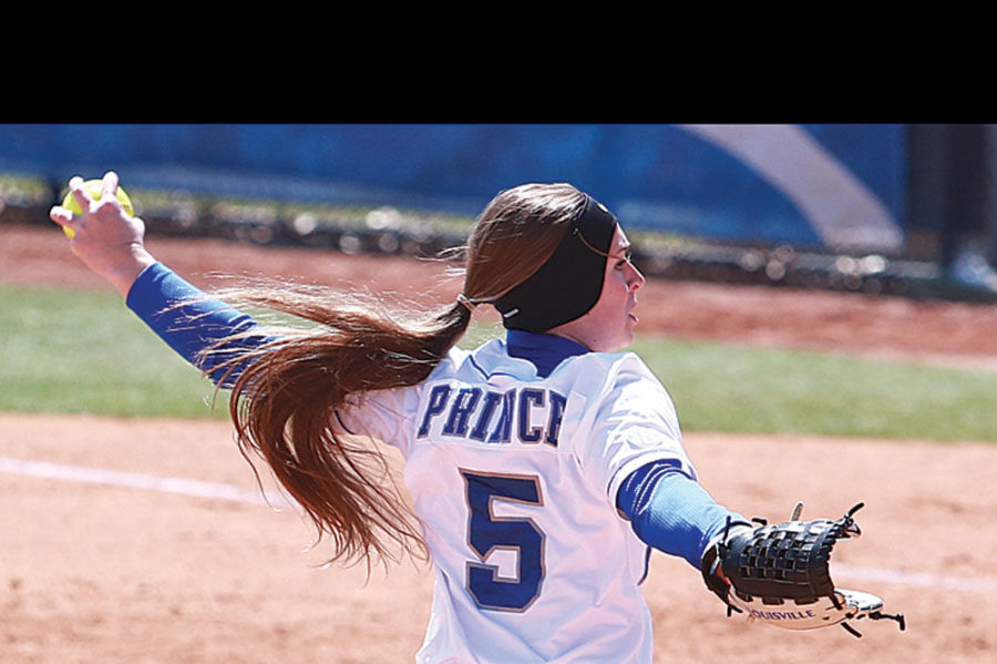 UK freshman pitcher, 5, Meagan Prince winding up for a pitch during the UK softball game vs. Auburn at the John Cropp Stadium on Sunday, March 30, 2014, in Lexington, Ky. Photo by Kalyn Bradford