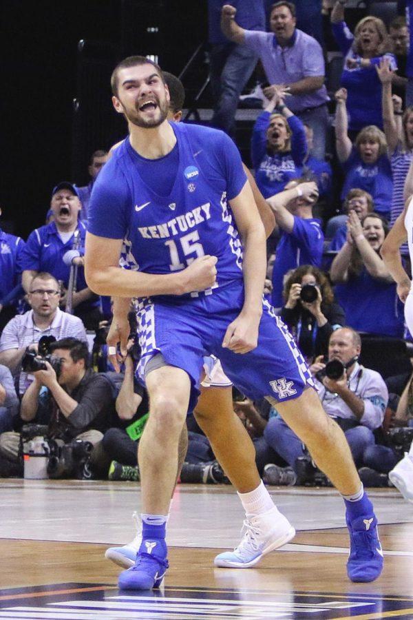 Kentucky Wildcats forward Isaac Humphries celebrates after hitting a jump shot during the 2017 NCAA Men's Basketball Tournament South Regional Elite 8 at FedExForum on Sunday, March 26, 2017 in Memphis, KY. Photo by Addison Coffey | Staff.