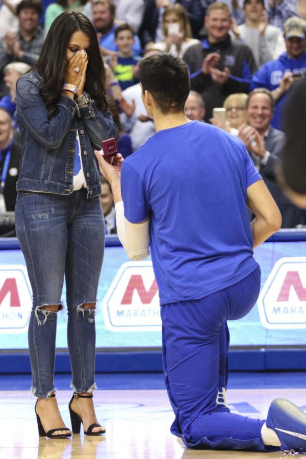 Derek Willis proposes to his girlfriend Keely Potts prior to the Wildcats game against the Vanderbilt Commodores at Rupp Arena on February 28, 2017 in Lexington, Kentucky.