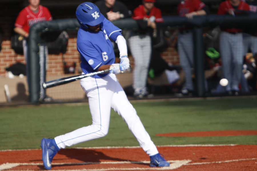Outfielder Tristan Pompey hits the ball up the middle during a game against the Western Kentucky Hilltoppers on Wednesday, March 1, 2017 in Lexington, Ky. Photo by Carter Gossett | Staff