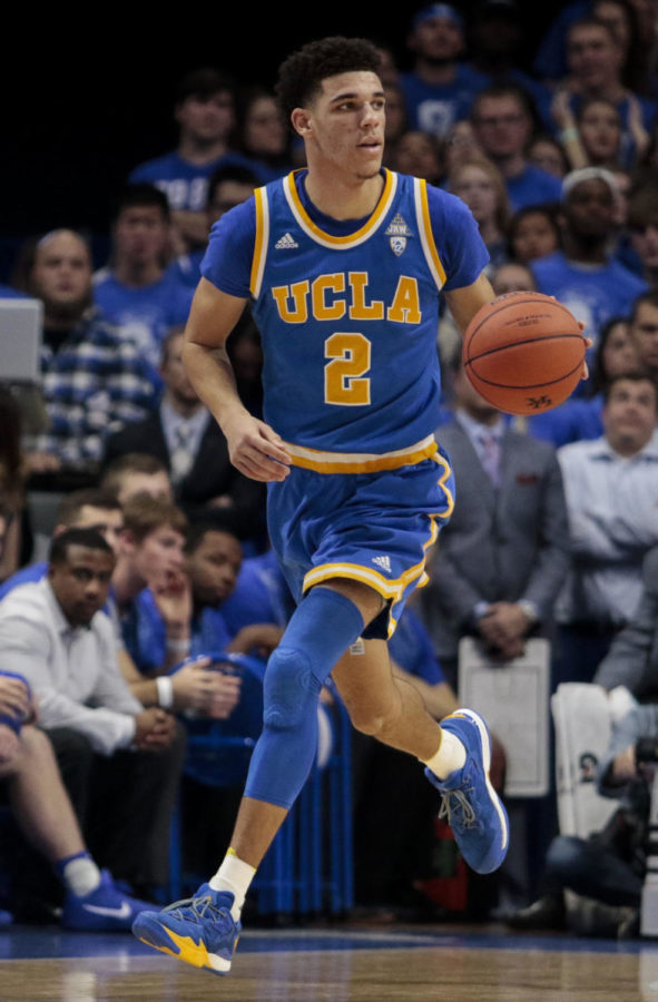 Lonzo Ball dribbles down the court during the Wildcats game against the UCLA Bruins at Papa Johns Stadium on December 3, 2016 in Louisville, Kentucky.