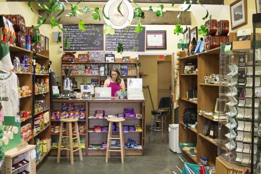 Senior Journalism major Claire Johnson works behind the counter of F·ilte, a local store specializing in food and other items from Ireland and Scotland. It is located on North Upper Street in Lexington. 