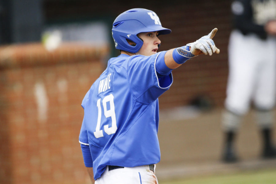 Kentucky Wildcats first baseman Evan White points to the dugout after scoring a run during the game against the Vanderbilt Commodores at Cliff Hagan Stadium on Saturday, April 1, 2017 in Memphis, KY. Photo by Addison Coffey | Staff.