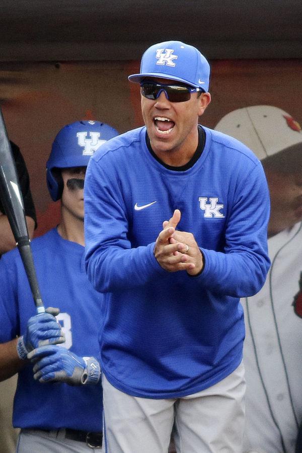 Kentucky Wildcats head coach Nick Mingione encourages Luke Becker during his at bat in the top of the third inning of the game against the Louisville Cardinals at Jim Patterson Stadium on Tuesday, April 4, 2017 in Louisville, KY. Photo by Addison Coffey | Staff.