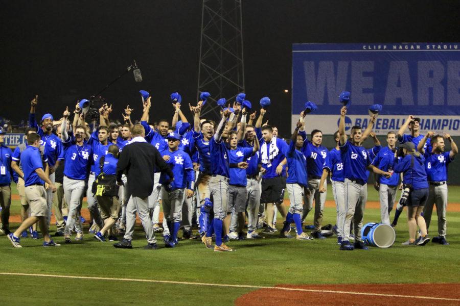 The Kentucky Wildcats baseball team celebrates winning the region championship game of the Lexington Regional at Cliff Hagan Stadium on Tuesday, June 6, 2017 in Lexington, KY. Photo by Addison Coffey | Staff.