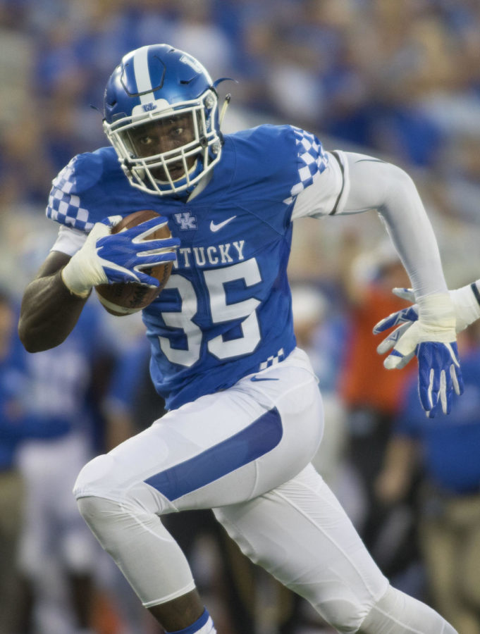 Kentucky defensive end Denzil Ware rushes to the end zone after sacking the quarterback during the Wildcat's game against the Southern Miss Golden Eagles at Commonwealth Stadium on Sept. 2, 2016 in Lexington, Kentucky.