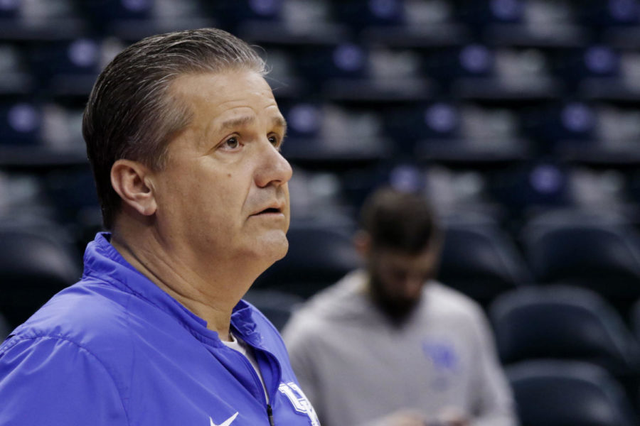 Head coach John Calipari watches his team during the open practice at Bakers Life Fieldhouse on Thursday, March 16, 2017 in Indianapolis, In.