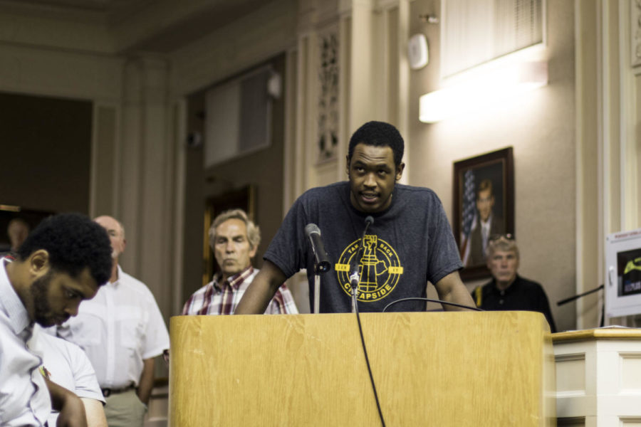 Founder of Take Back Cheapside DeBraun Thomas speaks during the council meeting held to vote on the removal of two Confederate statues in downtown Lexington. The two statues include one of John Hunt Morgan, a Confederate general, and another, John C. Breckinridge, the last Confederate Secretary of War. The final, unanimous vote was taken on Thursday, Aug. 17, 2017 at the Lexington-Fayette Urban County Government Center in Lexington, Kentucky. Photo by Arden Barnes | Staff