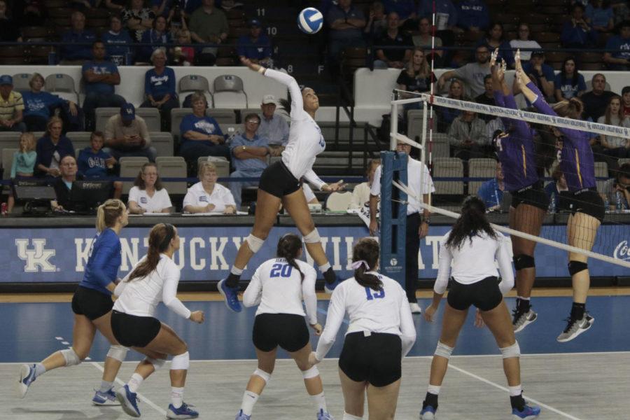 Freshman outside hitter Leah Edmond attacks the ball while her team covers her during the match against LSU on Friday, November 18, 2016 in Lexington, Ky. Kentucky won the match 3-0. Photo by Hunter Mitchell | Staff