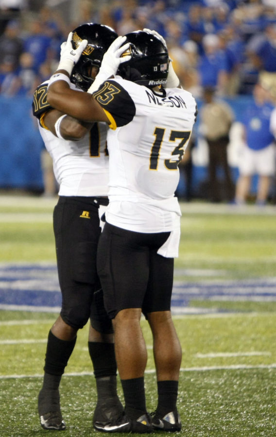 Southern Miss defensive back Picasso Nelson Jr. celebrates with Southern Miss linebacker DNerius Antoine during the football game against Southern Miss on Saturday, September 3, 2016 in Lexington, Ky. Photo by Hunter Mitchell | Staff