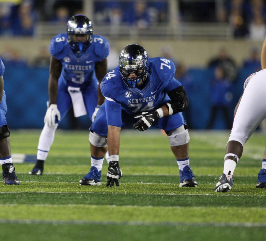 Cole Mosier plays in a game against Auburn in October 2015. Mosier tore his ACL in a scrimmage last Saturday and is out for the season. Photo provided by Chet White | UK Athletics