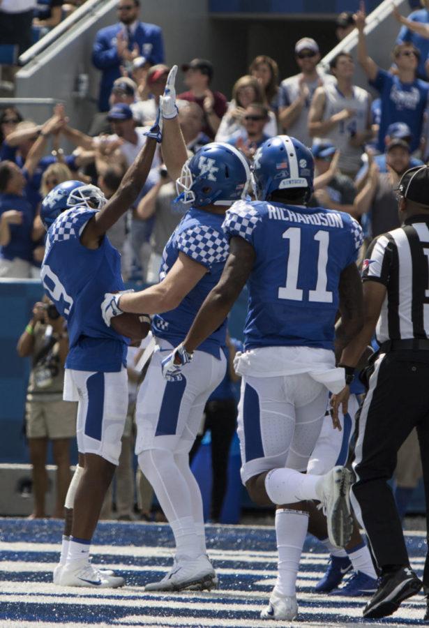 The University of Kentucky Wildcats celebrate after a touchdown during the game against EKU on Saturday, September 9, 2017 in Lexington, Ky. Kentucky defeated EKU 27 to 16. Photo by Arden Barnes | Staff