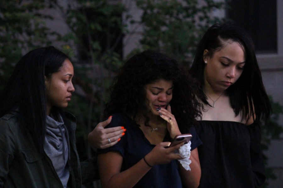 Gabrielas roommate Madison Katuramu (left) and sister Sydney Banks (right), as well as other fellow UK students shared a heartfelt moment of remembrance at the vigil of Freshman Gabriela Garay in front of Jewell Hall Thursday, Sept. 7,2017 in Lexington, KY. Photo by Kaitlyn Gumm| Staff
