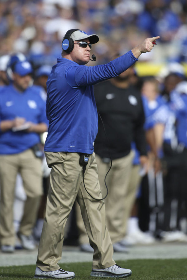 Head coach Mark Stoops of the Kentucky Wildcats yells a command at his team during the first half of the TaxSlayer Bowl against the Georgia Tech Yellow Jackets at EverBank Field on Saturday, December 31, 2016 in Jacksonville, Florida. Photo by Michael Reaves | Staff.