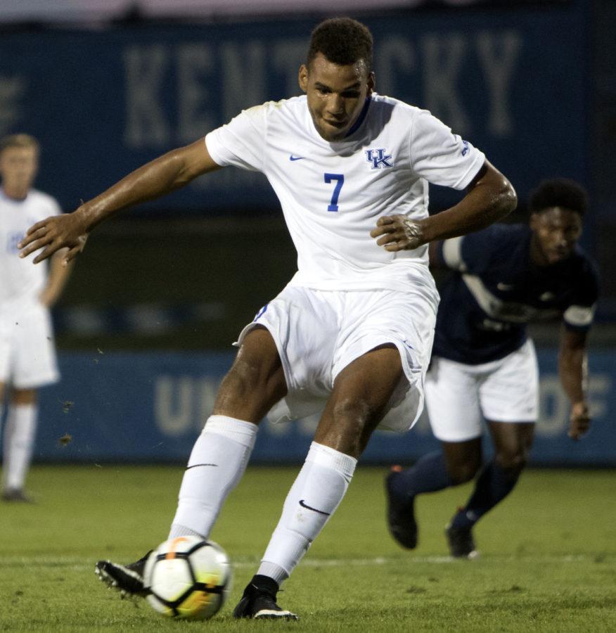 Sophomore J.J. Williams scores a penalty kick during the game against Xavier on Wednesday, September 20, 2017 in Lexington, Ky. Kentucky tied Xavier 1-1. Photo by Carter Gossett | Staff