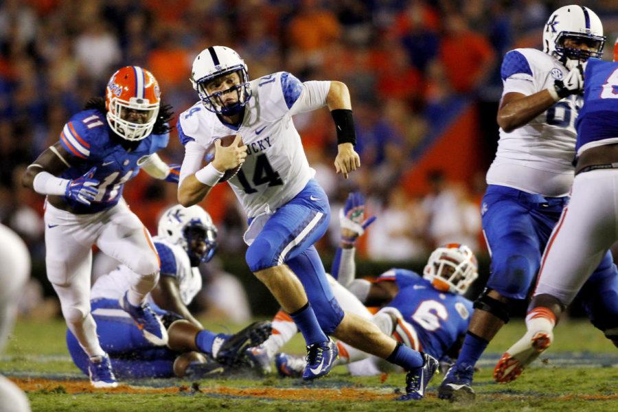 Patrick Towles. The University of Kentucky football team lost a heartbreaker to Florida 36-30 in triple overtime on Saturday, September 13, 2014, at Ben Hill Griffin Stadium in Gainesville, Fla. Photo by Chet White | UK Athletics